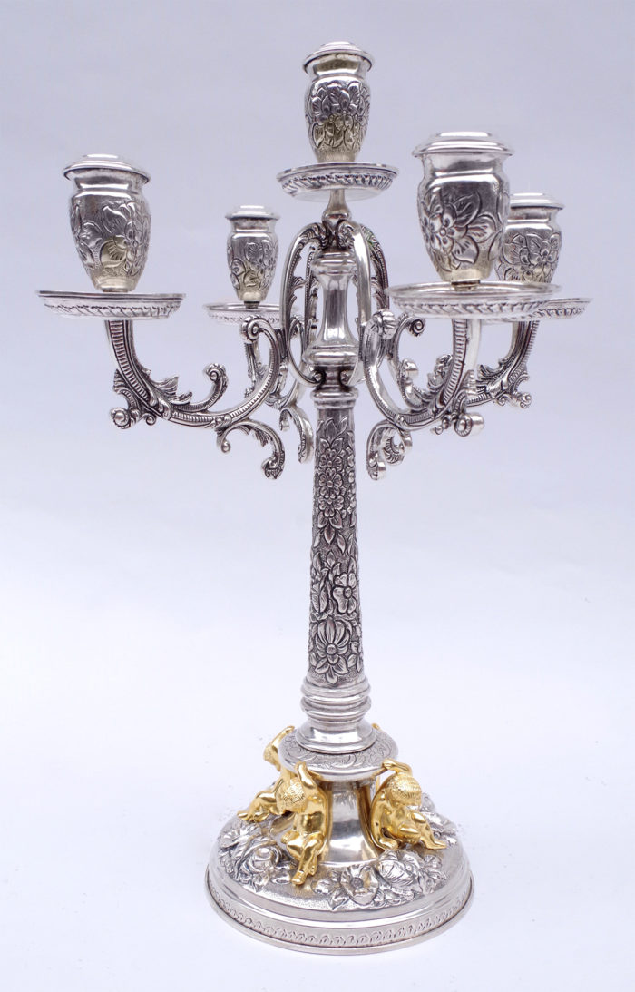 solid silver putti candelabras