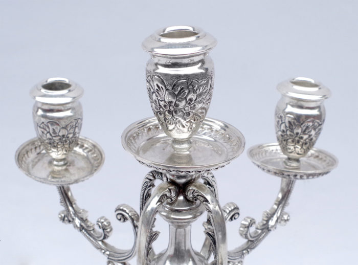 solid silver putti candelabras