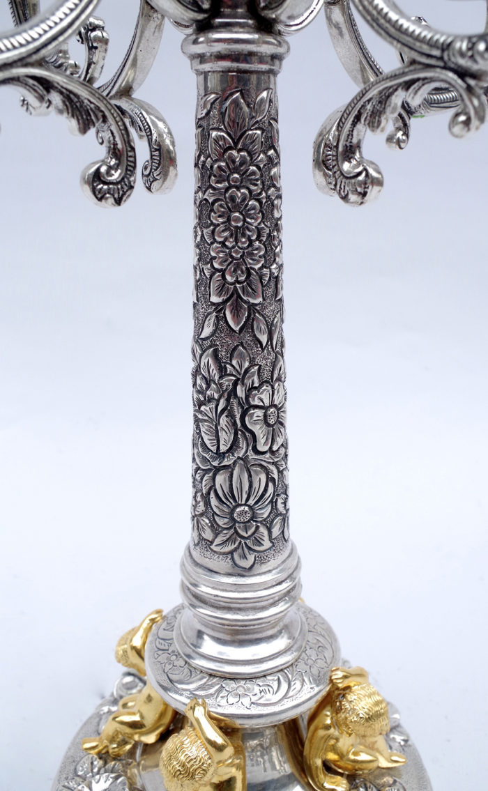 solid silver putti candelabras