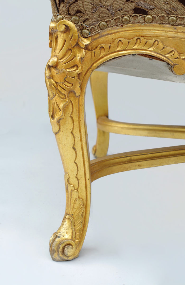 Regence giltwood armchairs