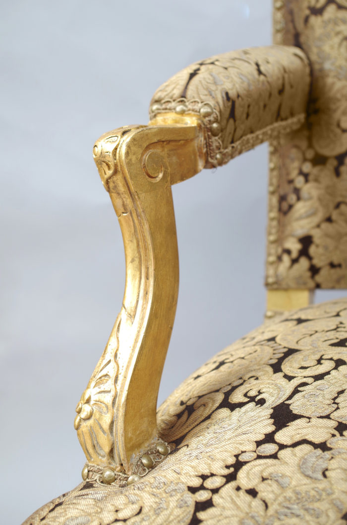 Regence giltwood armchairs