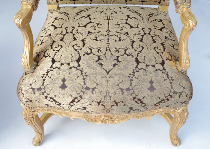 Regence giltwood armchairs