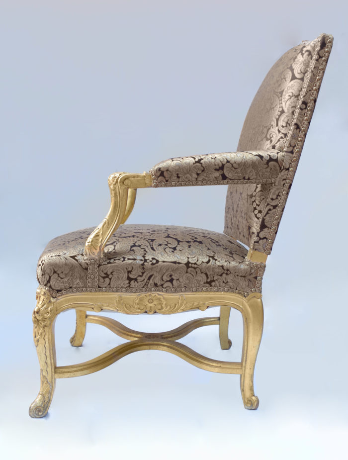 Regence giltwood armchairs