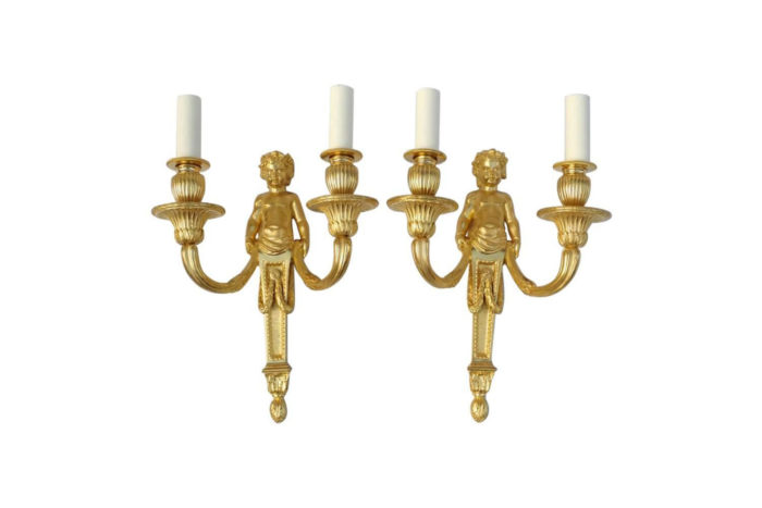 Pair of Louis XVI putti gilt bronze sconces