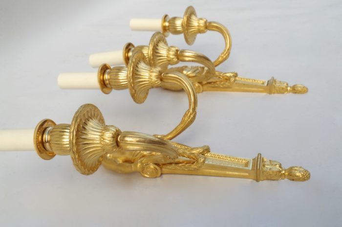 Pair of Louis XVI putti gilt bronze sconces