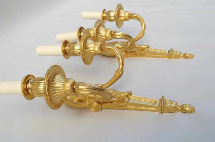 Pair of Louis XVI putti gilt bronze sconces