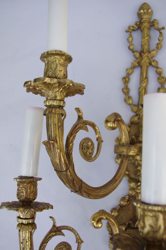 pair of two ranks gilt bronze sconces