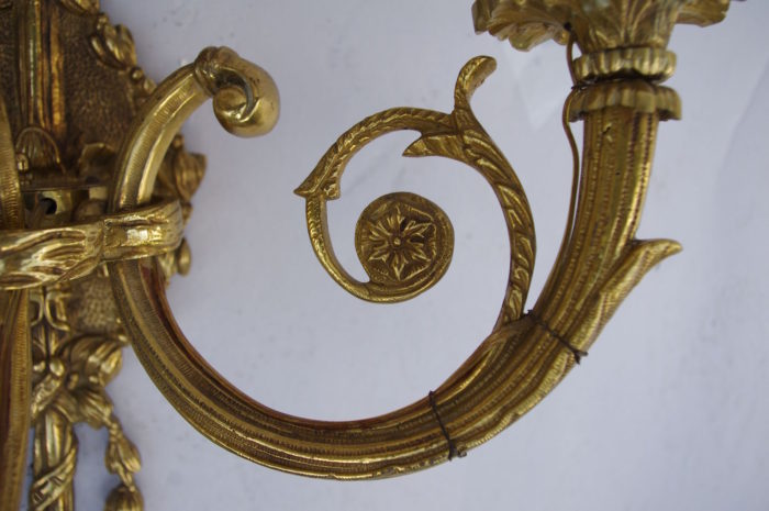 pair of two ranks gilt bronze sconces