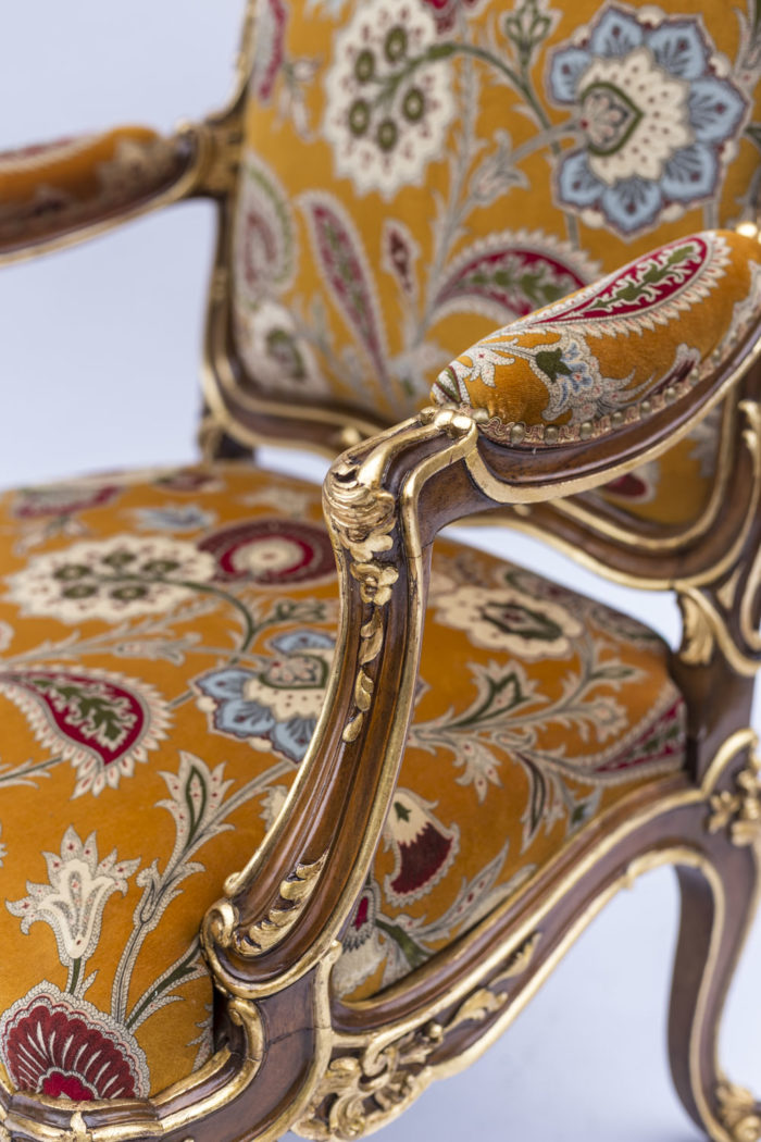 louis xv style à chassis armchairs natural walnut gilt highlights