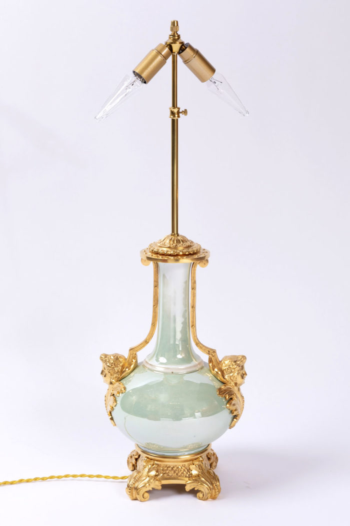 green iridescent lamp protome without lampshade