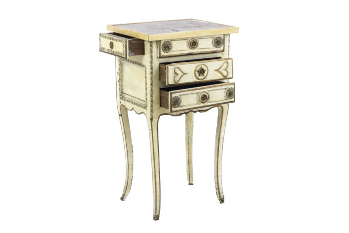 yellow louis xv bedside table opened drawers