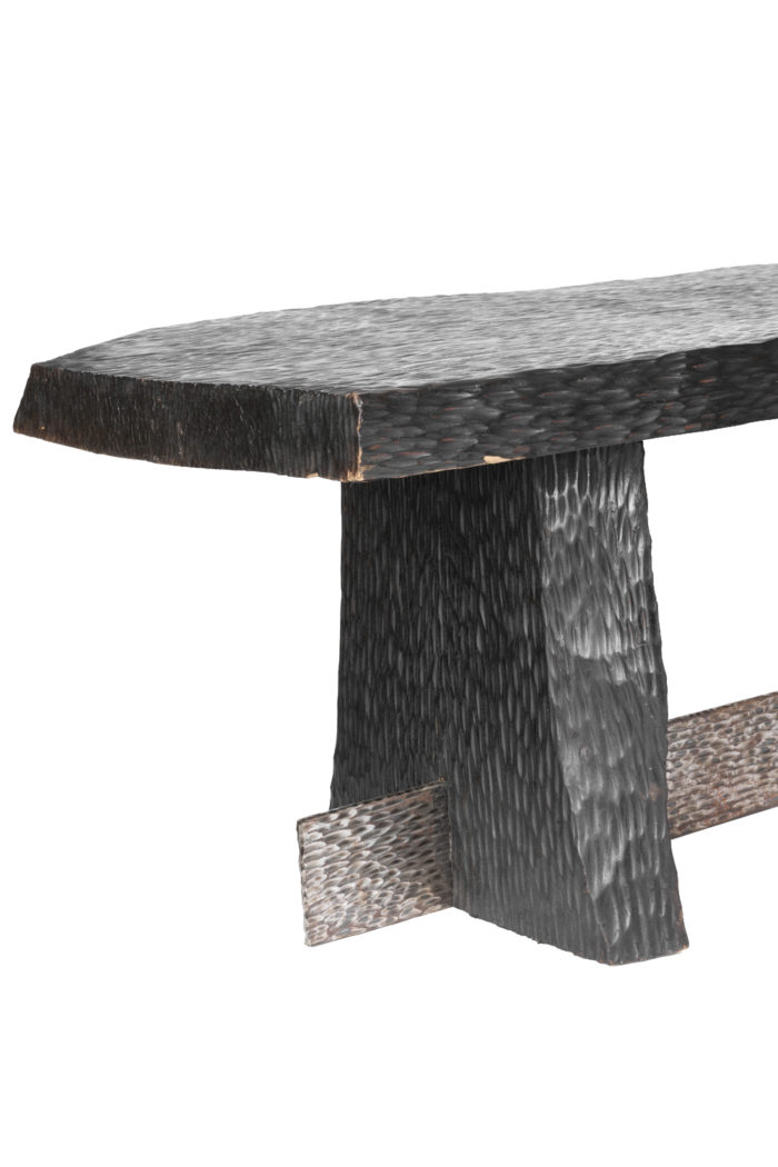 coffee table gouged wood and silvered metal leg
