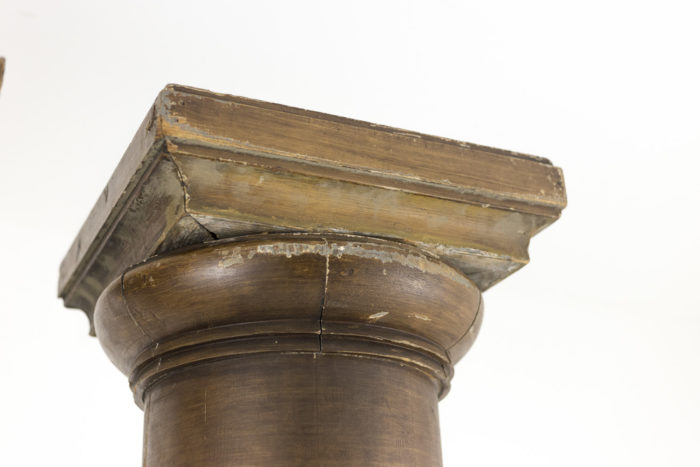 fluted columns wood brown lacquered capital