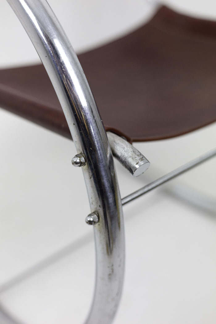 armchair chromed metal detail