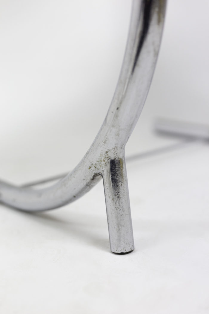 armchair chromed metal leg detail