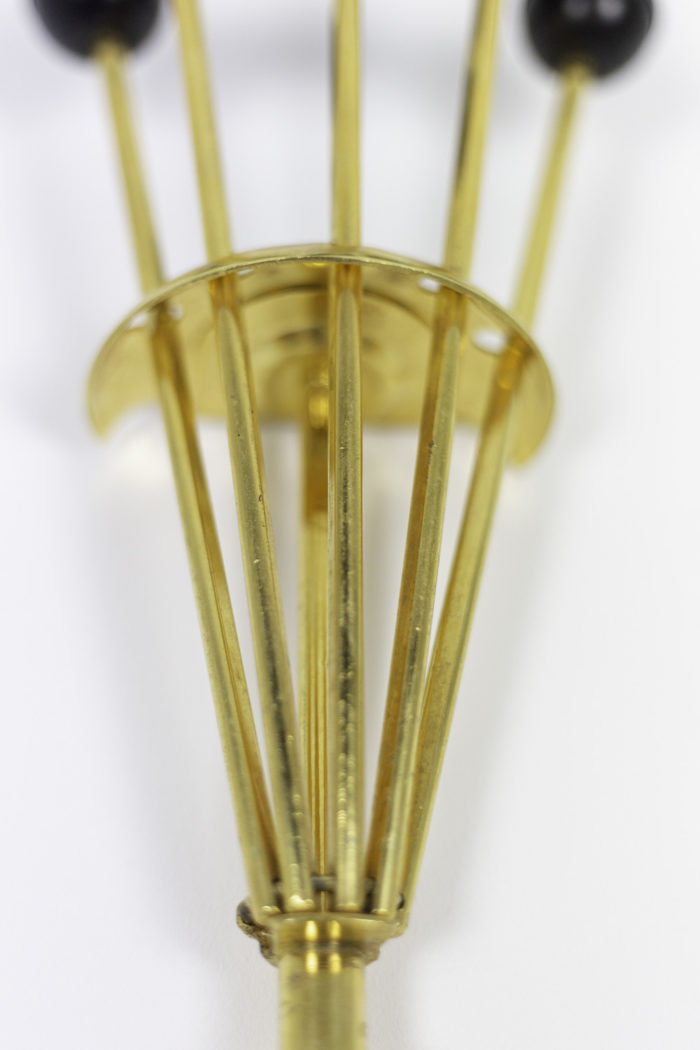 retractable coat-hanger gilt brass sticks