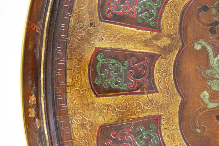 table basse laque style persan bronze doré cartouches