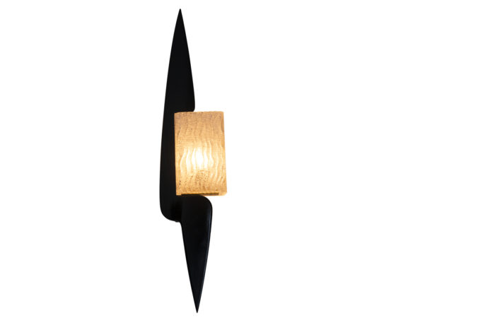 One wall sconce lighted