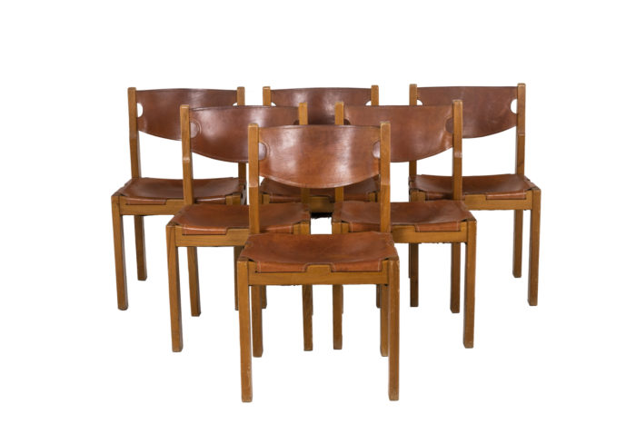 Maison Regain, Series of six chairs in elm and leather