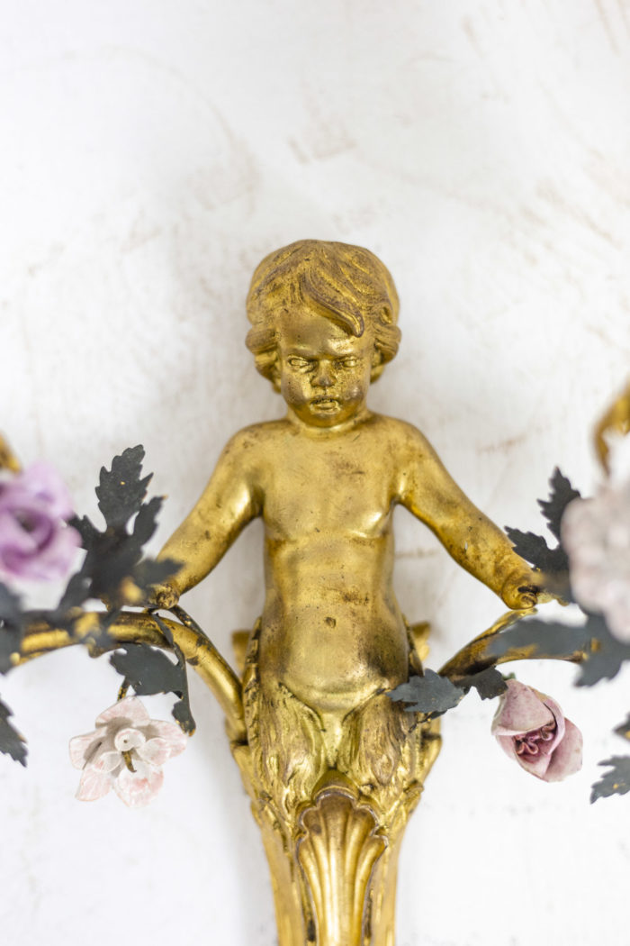 Pair of wall sconces- focus putti