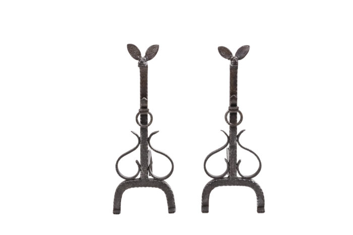 Pair of cast andirons in iron representing dogs - back