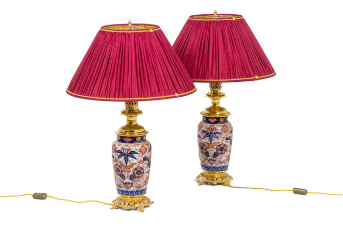 Pair of lamps in porcelain and bronze - face