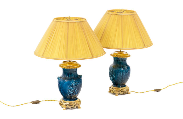 Pair of lamps in ceramic and gilt bronze - face