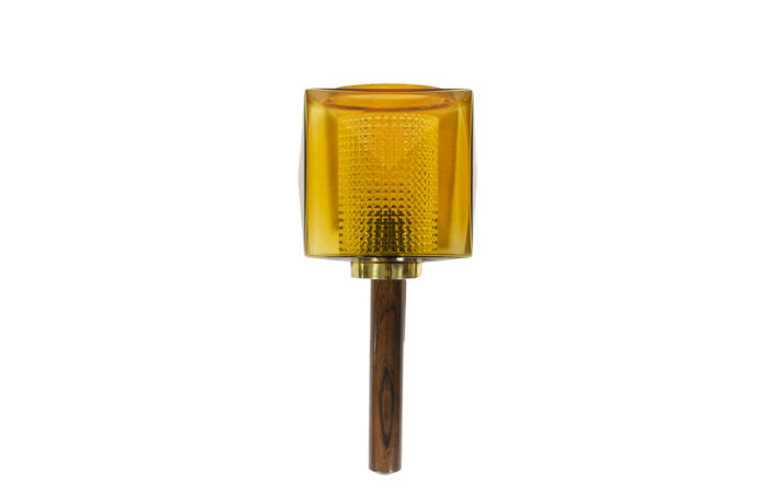 Wall sconce in rosewood and glass, rectangular in shape. Granite glass, translucent and yellow in color - face