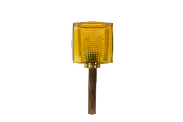 Wall sconce in rosewood and glass, rectangular in shape. Granite glass, translucent and yellow in color - face