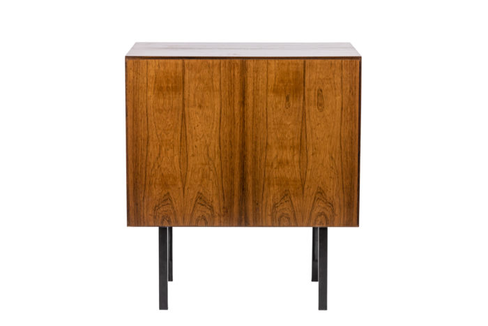 Sideboard in rosewood opening with a door and resting on four black metal legs - back