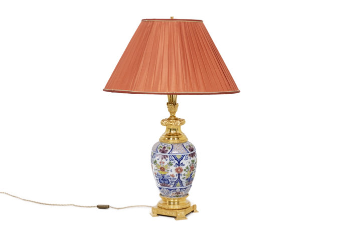 Delft earthenware lamp, polychrome. Gilt bronze mount. Quadripod base - face