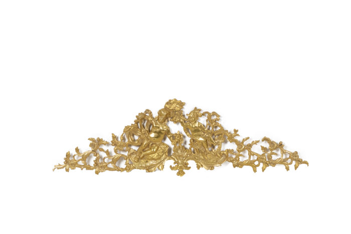 Gilded bronze pediment - face