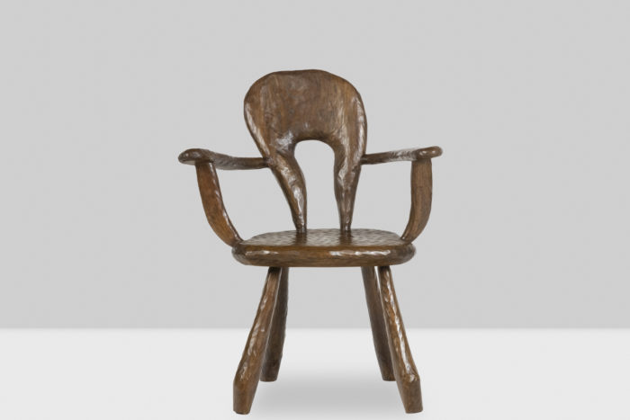 Maison Chevalier, Brutalist armchair in gouged wood. 1960s. - face