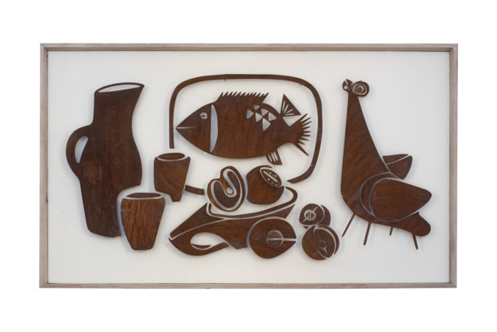 Decorative metal sign titled “Natumo”. Contemporary work. - face