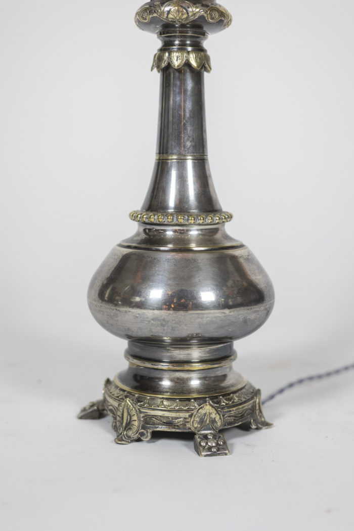 Pairs of lamps in metal and silvered bronze. Circa 1880.