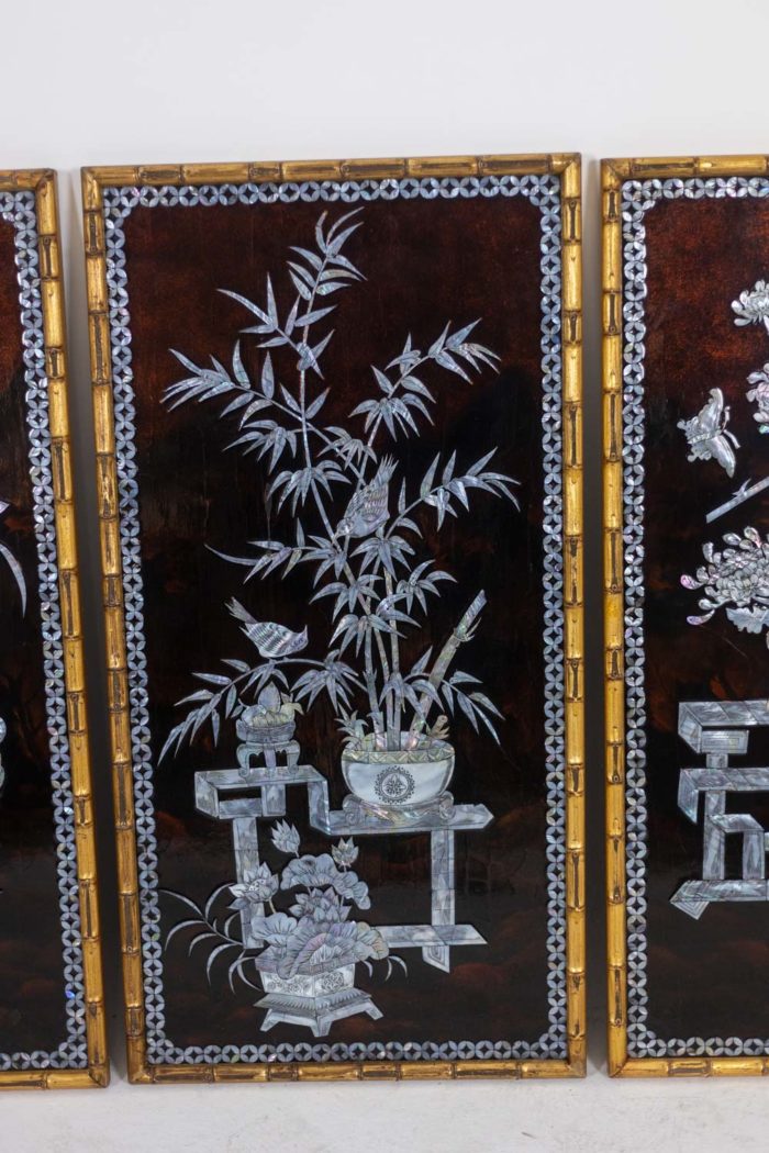 Set of four Vietnamese lacquer panels. 1950s.