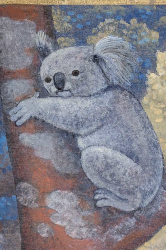 Panneau décoratif ou toile peinte représentant des koalas - focus