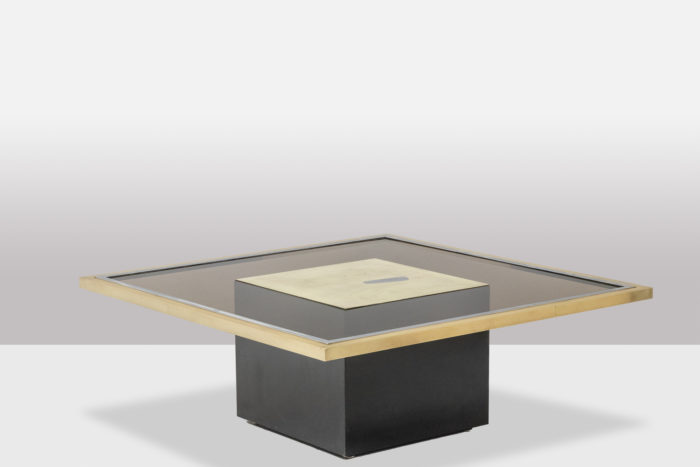 Coffee table in gilded brass and smoked glass. 1970s.