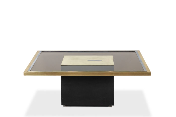 Coffee table in gilded brass and smoked glass. 1970s.