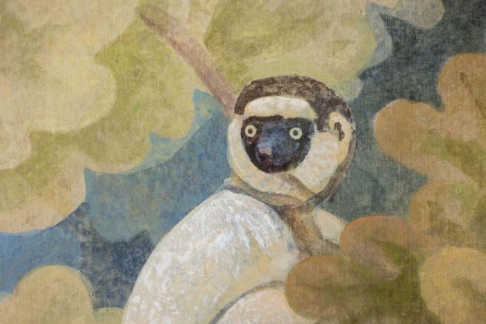 Toile peinte ou panneau décoratifs représentant des singes sur un fond feuillagé - focus