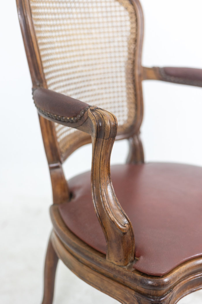 Pair of "cabriolet" armchairs in walnut and canework. Louis XV period.